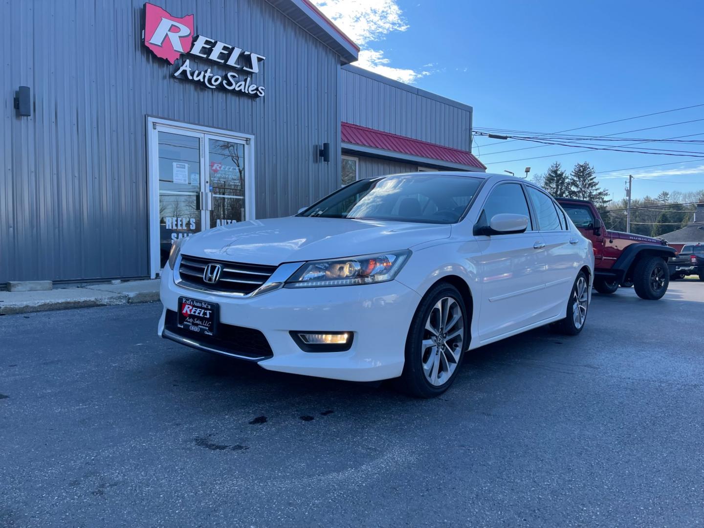 2013 White /Black Honda Accord Sport (1HGCR2F50DA) with an 2.4L I4 DOHC 16V engine, Automatic transmission, located at 547 E. Main St., Orwell, OH, 44076, (440) 437-5893, 41.535435, -80.847855 - This 2013 Honda Accord Sport CVT is a reliable and fuel-efficient sedan. It is powered by a 2.4-liter four-cylinder engine that produces 189 horsepower. The CVT (continuously variable transmission) provides smooth and efficient acceleration. The Accord Sport CVT comes equipped with features such as - Photo#0